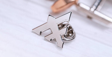 Choosing the Right Pin: Soft Enamel vs. Die Struck Pins