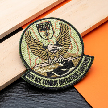 Embroidered military patch for the 609 AOC Combat Operations Division featuring an eagle perched over lightning bolts.