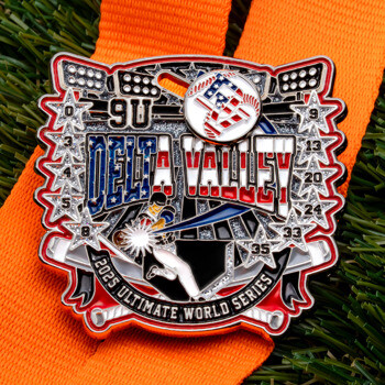 Custom baseball medal featuring 'Delta Valley' text with American flag patterns, stars, and an orange ribbon on artificial grass.