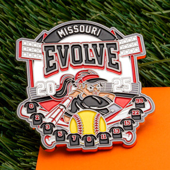 Custom softball lapel pin for Missouri Evolve 2025 featuring a player, yellow ball, stadium lights, and team jersey numbers on grass.