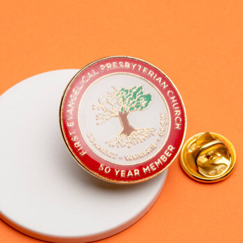 Enamel lapel pin for First Evangelical Presbyterian Church 50 Year Member featuring a tree design on a white and red background.