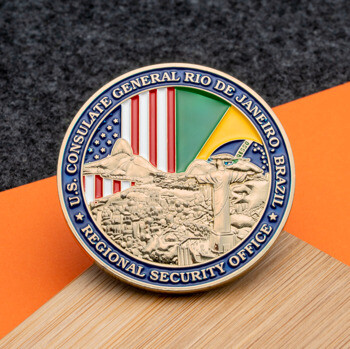 Challenge coin for the U.S. Consulate General Rio de Janeiro Regional Security Office featuring the Christ the Redeemer statue and dual-nation flags.
