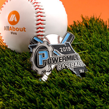 Custom baseball lapel pin for Powermill Baseball 2019 featuring a gear, bats, and ball design on grass.
