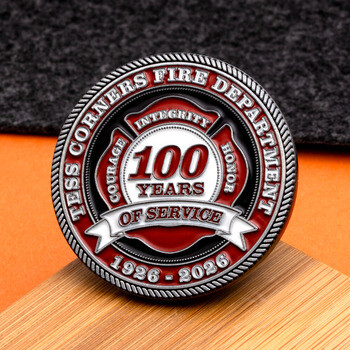 Tess Corners Fire Department 100 Years of Service challenge coin featuring red, white, and black enamel detailing.