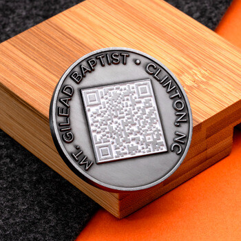 Antique silver challenge coin for Mt. Gilead Baptist Clinton, NC featuring an engraved QR code in the center.